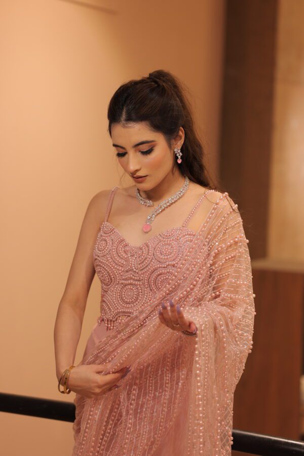 pink heavy pearl work drape saree