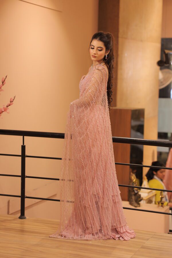 pink heavy pearl work drape saree