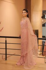 pink heavy pearl work drape saree