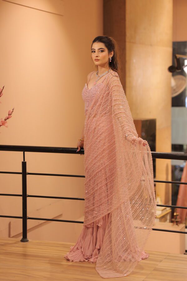 pink heavy pearl work drape saree