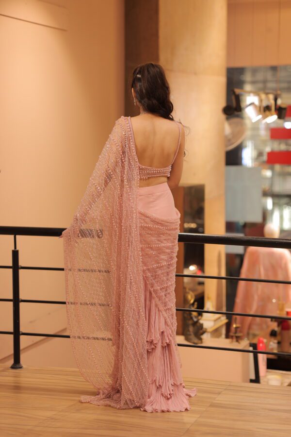 pink heavy pearl work drape saree