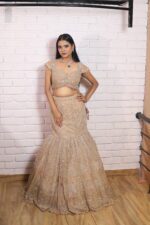 Beige gold fish cut lehenga with dupatta