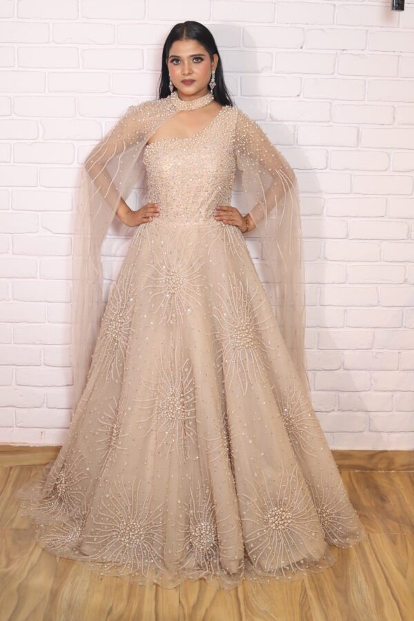 light peach pearl ball gown with one side drape