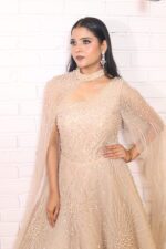 light peach pearl ball gown with one side drape