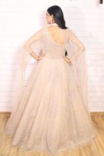 light peach pearl ball gown with one side drape