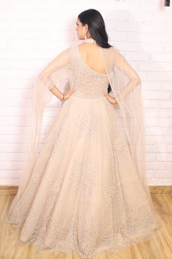 light peach pearl ball gown with one side drape