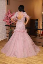 fish cut gown with feather cape