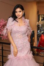 fish cut gown with feather cape