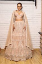 peach designer belt blouse lehenga