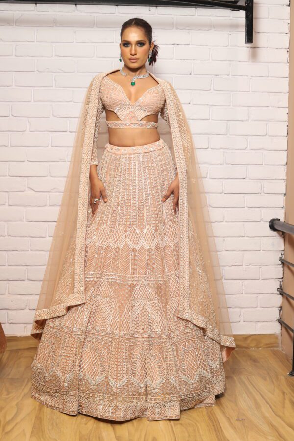 peach designer belt blouse lehenga