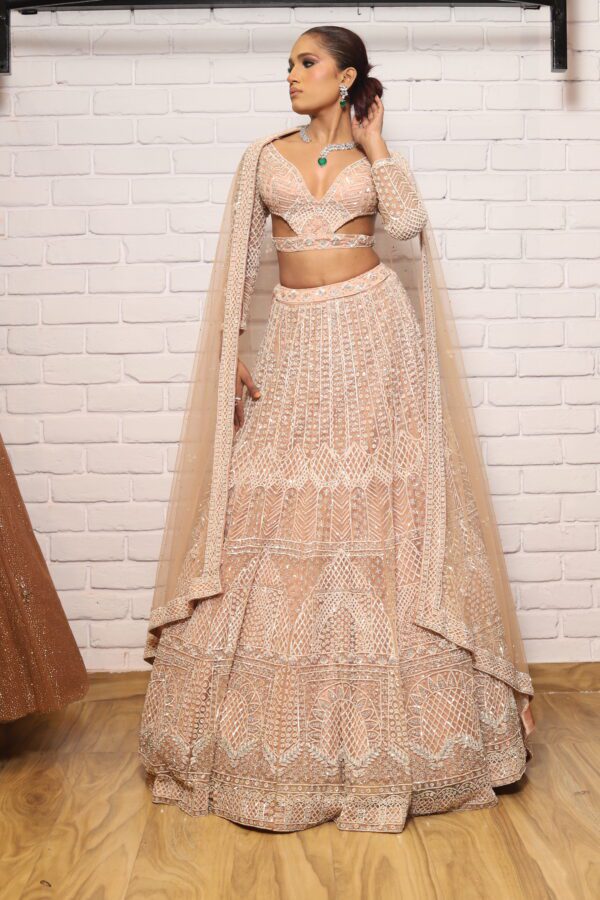 peach designer belt blouse lehenga