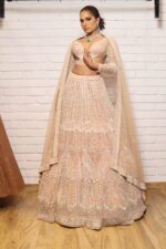 peach designer belt blouse lehenga