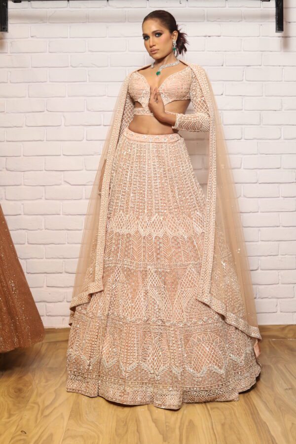 peach designer belt blouse lehenga