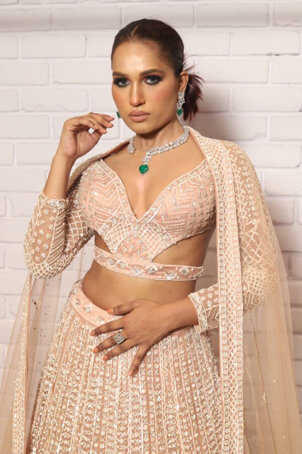peach designer belt blouse lehenga