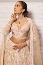 peach designer belt blouse lehenga