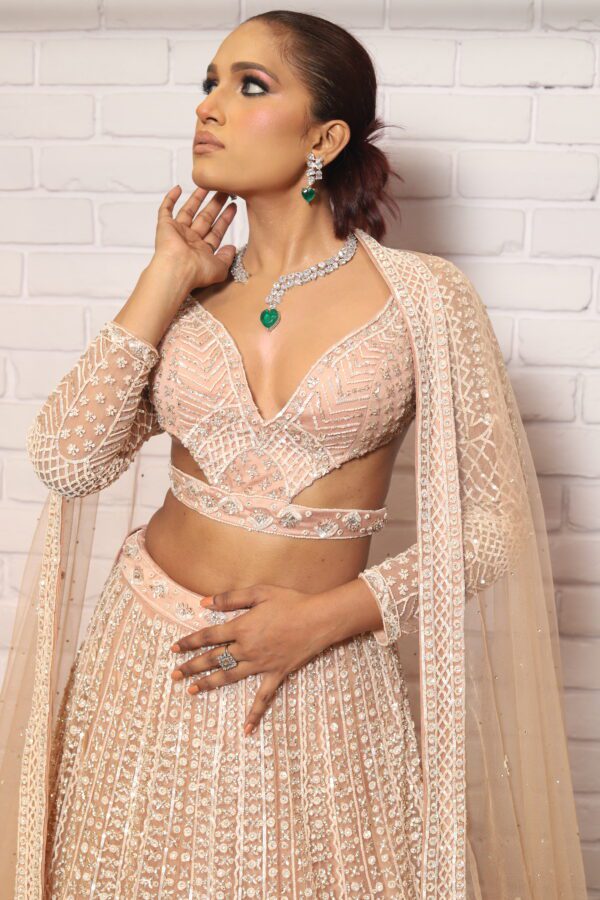 peach designer belt blouse lehenga