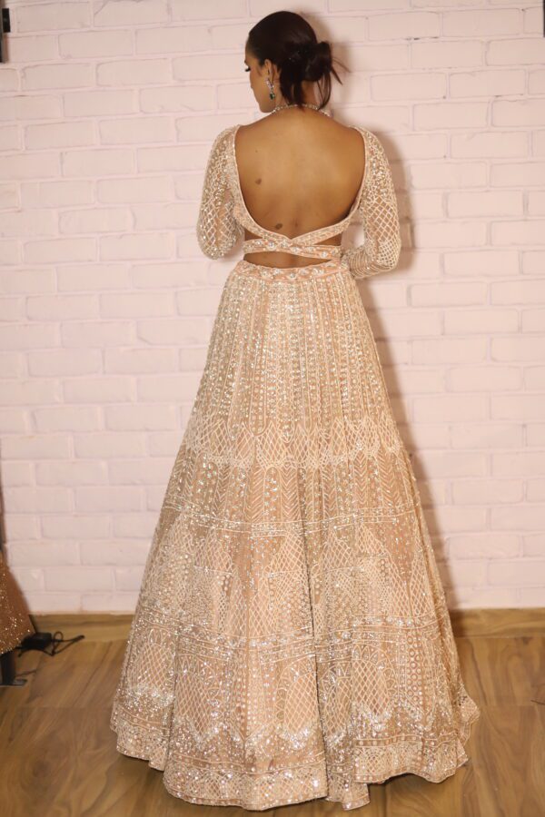 peach designer belt blouse lehenga